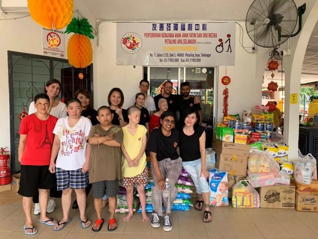 A group photo with the team from Elements Talent Consultancy and the residents/employees of the old folks home